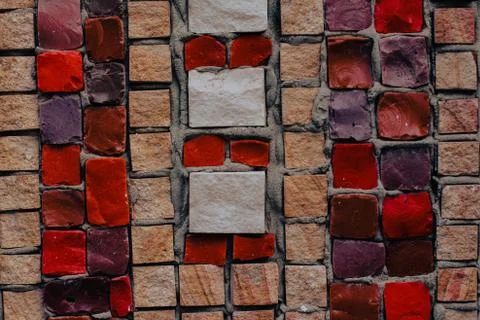 Texture background of mosaic multi colored stones on the wall. Colorful texture  Stock Photos