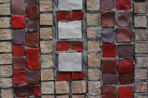 Texture background of mosaic multi colored stones on the wall. Colorful texture  Stock Photos