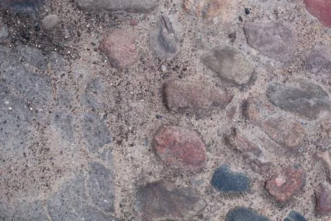 Texture, background. Old cobblestone road pavement texture Stock Photos