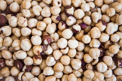 Texture, background or pattern of shelled hazelnuts, close up Stock Photos