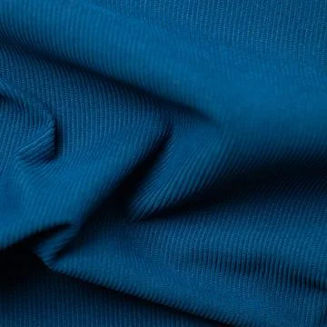 Texture, background, pattern. Blue silk fabric Stock Photos