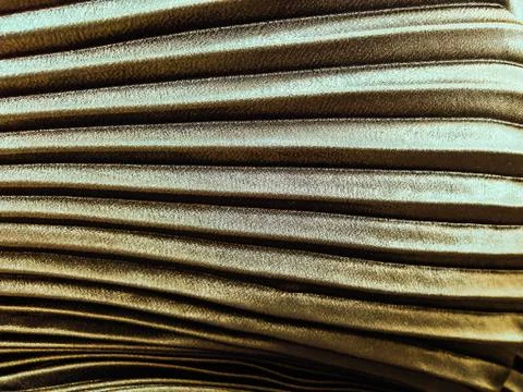 Texture, background, pattern, Cloth pleated brown. A shiny finished folded sa Stock Photos
