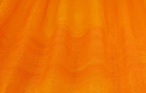 Texture, background, pattern. Orange Silk Fabric for Drapery Abstract Stock-Fotos