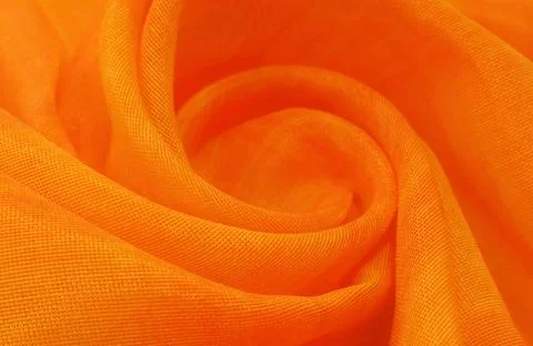 Texture, background, pattern. Orange Silk Fabric for Drapery Abstract Foto stock