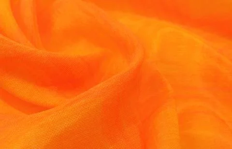 Texture, background, pattern. Orange Silk Fabric for Drapery Abstract Foto stock