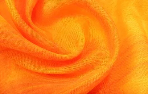Texture, background, pattern. Orange Silk Fabric for Drapery Abstract Stock Photos