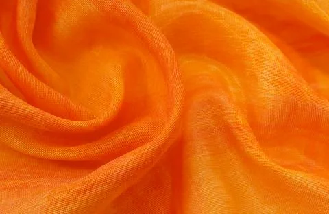 Texture, background, pattern. Orange Silk Fabric for Drapery Abstract Backgro Foto stock
