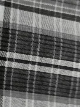 Texture, background, pattern, silk fabric, black and white lines, checkered.. Stock Photos