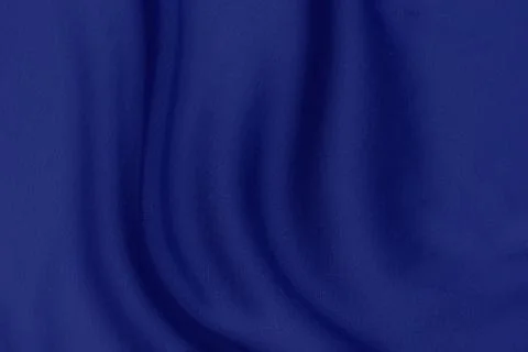 Texture, background, pattern. Texture of blue silk or cotton or wool fabric.  Stock Photos