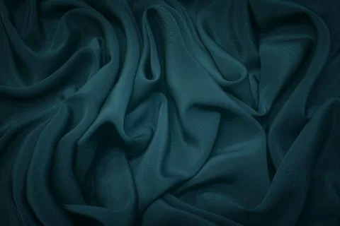 Texture, background, pattern. Texture of green silk or cotton fabric. Beautif Stock Photos