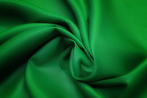 Texture, background, pattern. Texture of green silk or cotton fabric. Beautif Stock Photos