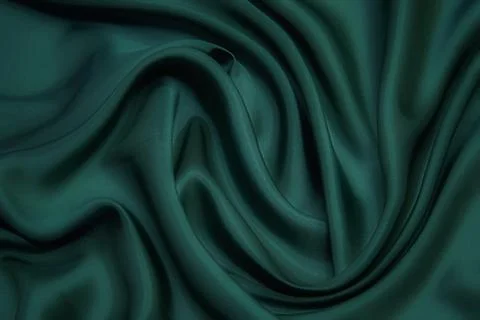 Texture, background, pattern. Texture of green silk fabric. Beautiful emerald 스톡 사진