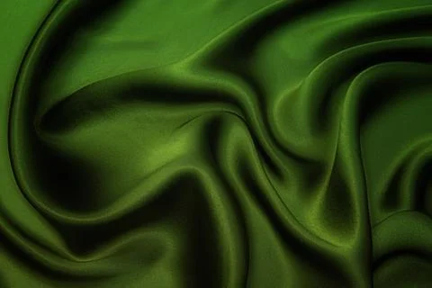 Texture, background, pattern. Texture of green silk fabric. Beautiful emerald Stock-Fotos