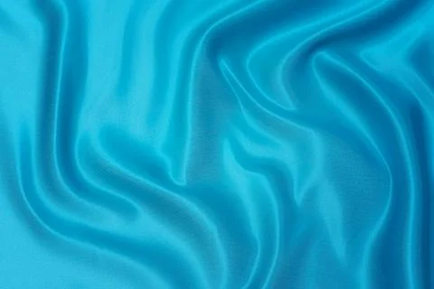 Texture, background, pattern. Texture of green silk fabric. Beautiful emerald Stock Photos