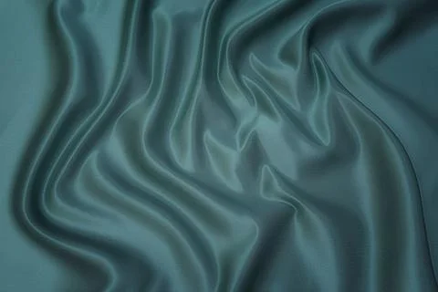 Texture, background, pattern. Texture of green silk fabric. Beautiful emerald Stock Photos