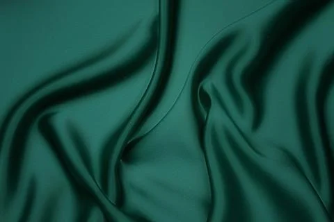 Texture, background, pattern. Texture of green silk fabric. Beautiful emera.. Foto stock