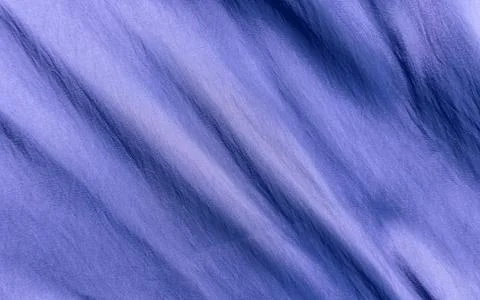 Texture, background, pattern. Texture of silk fabric. Beautiful silk fabric. Stock Photos