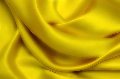 Texture, background, pattern. Texture of yellow silk or cotton or wool fabric Stock Photos