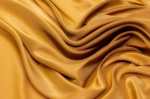 Texture, background, pattern. Texture of yellow or golden silk or cotton or w Stock Photos
