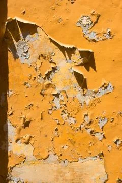 Texture background of a peeling orange paint Stock Photos