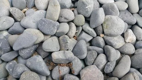 Texture background: Rock Pebbles, small, rounded, smooth pibbles with copy sp 스톡 사진