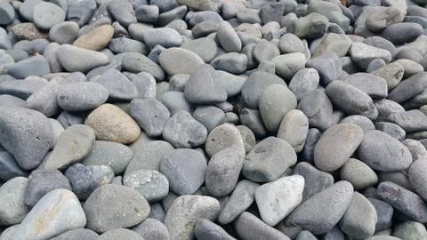 Texture background: Rock Pebbles, small, rounded, smooth pibbles with copy sp Stockfoto's