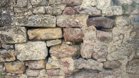 Texture background of the stone wall of the old city Stock Photos