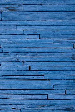 The texture of the background is from thin old boards painted in a rich blue Stock Photos