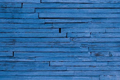 The texture of the background is from thin old boards painted in a rich blue Stock Photos
