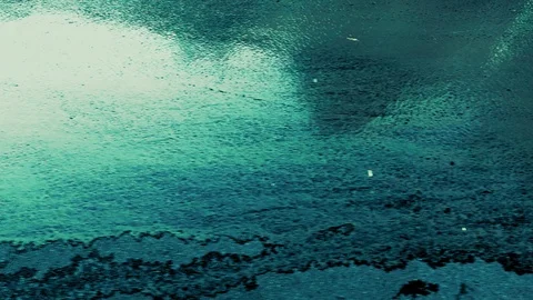 Texture background of water flow on asphalt in bright color Stock Footage 113424606