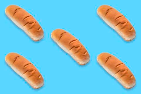 Texture background with white breads for hot dogs and sandwiches Stock Photos