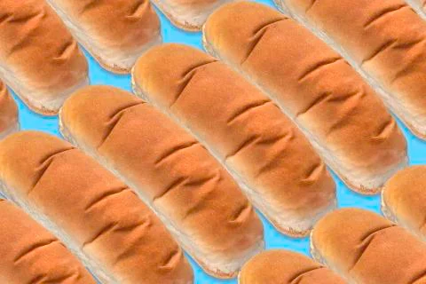 Texture background with white breads for hot dogs and sandwiches Foto stock
