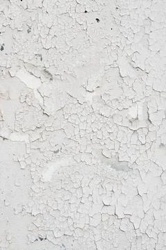 Texture, background white, cracked paint on the wall Stock Photos