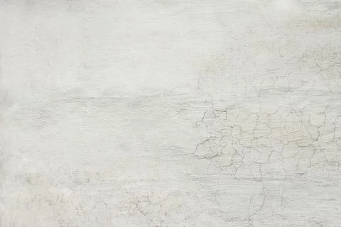 Texture background of white plastered wall with peeling paint Stock Photos