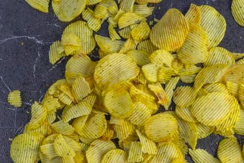 Texture, background in yellow. lined with corrugated chips on it Stock Photos