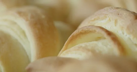 Texture of baked kiflice on baking tray 4K sliding video Video stock 262583192