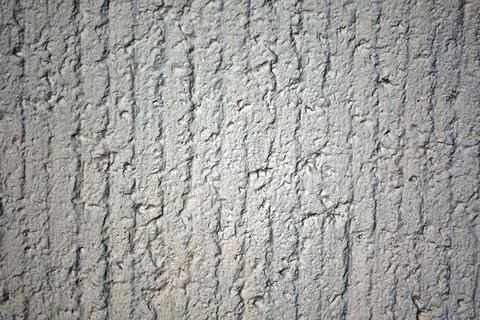 Texture of base layer of gray plaster. Stripes and groove Stock Photos