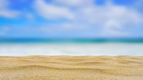 Texture of beach sand on blur seascape background. Video stock 112654409