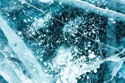 Texture of beautiful blue ice. Stock Photos