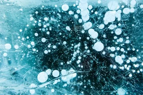 Texture of beautiful blue ice. Stock Photos