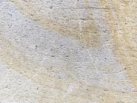 Texture of beige ancient stone, background Stock Photos