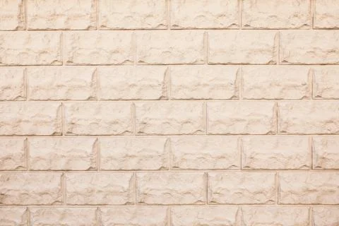 Texture of beige brick wall as background Stockfoto's