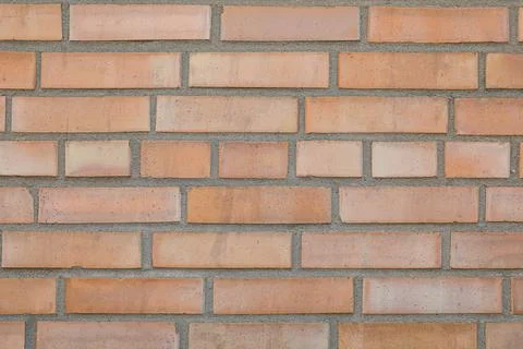 Texture of beige brick wall as background Stockfoto's