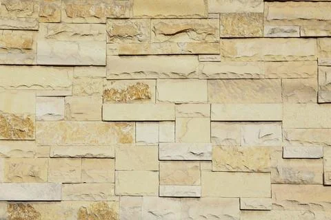 Texture of beige brick wall as background 库存照片