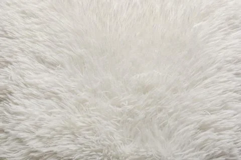 Texture of beige fluffy carpet as background Stock Photos