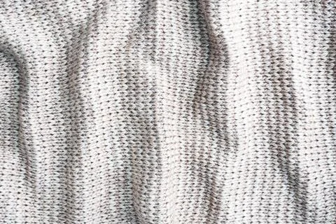 Texture beige knitted wool, background textile material. Close up. 스톡 사진