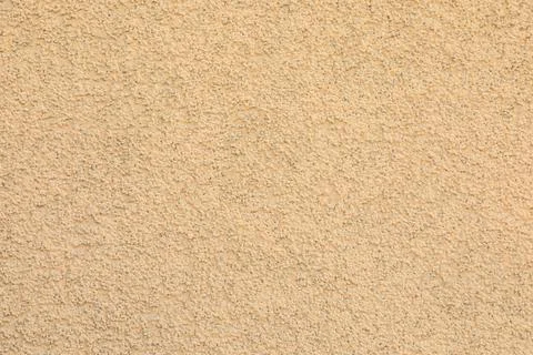 Texture of beige plaster wall as background Foto stock