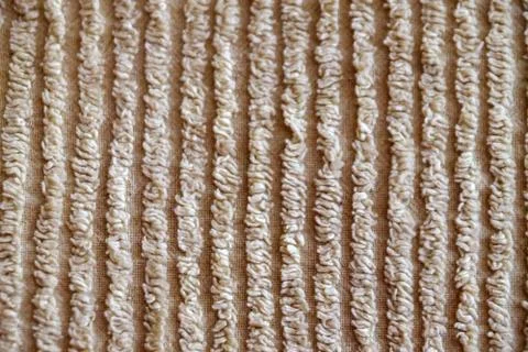 Texture of beige ribbed material for background Stock Photos