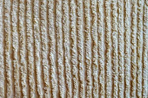 Texture of beige ribbed material for background Stock Photos