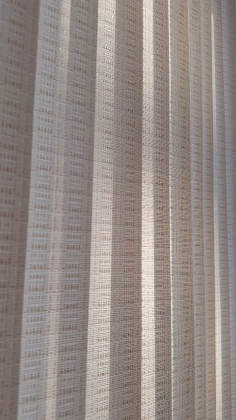 Texture of beige vertical blinds. Vertical video. Stock Footage 267690418